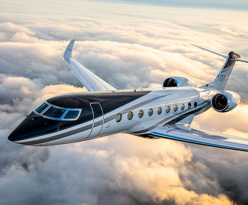 Gulfstream G700 ultra-long range jet above clouds